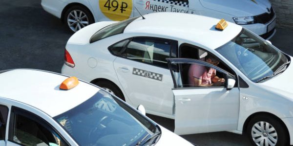 Sochi: white taxis waiting for their customers Sochi: white taxis waiting for their customers